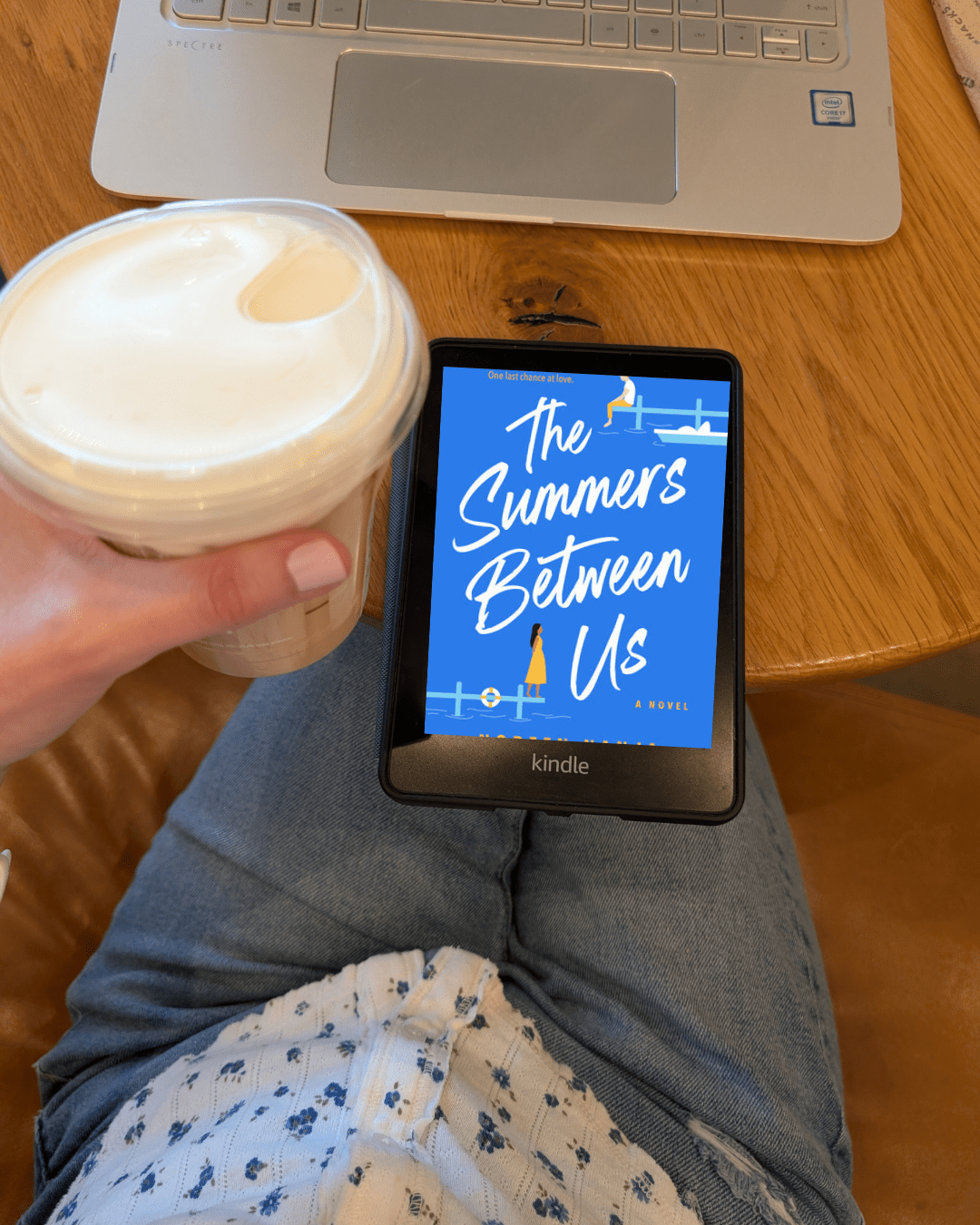 Coffee shop with an iced London Fog and a Kindle with The Summers Between Us